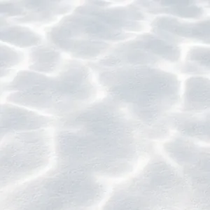 Close-up of a smooth white plaster pool finish under rippling water